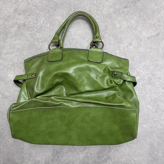 Green slouchy leather charm bag