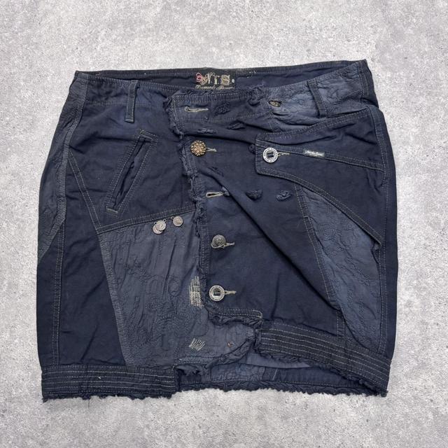 Distressed patchwork asymmetric skirt