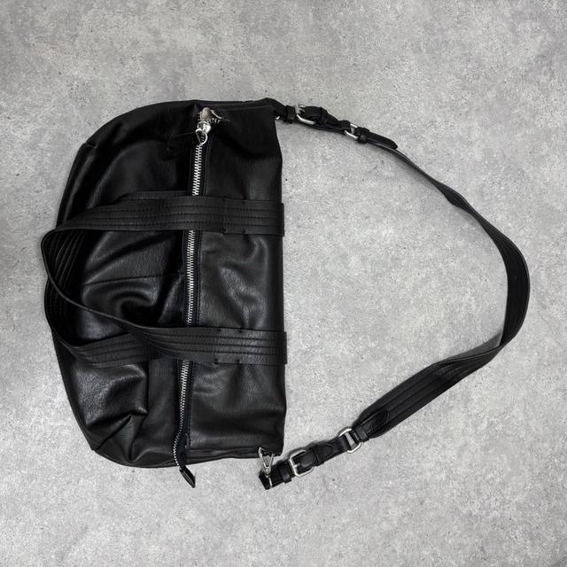 Slouchy black leather shoulder bag
