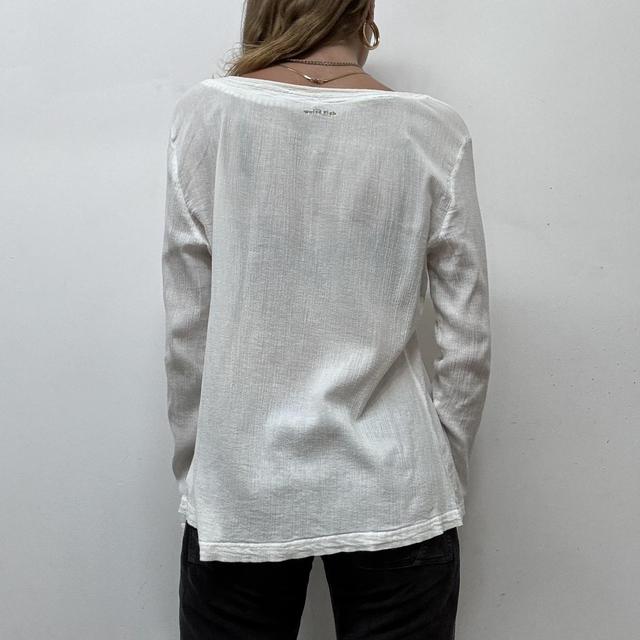 White embroidered flared cheesecloth shirt