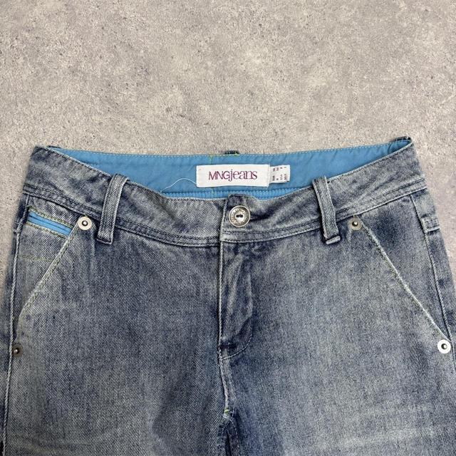 Low rise distressed flared jeans