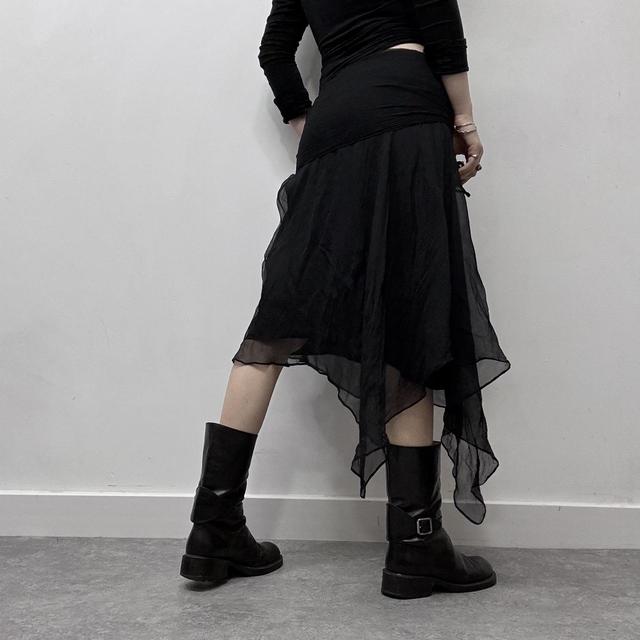 Sheer black asymmetric flutter skirt