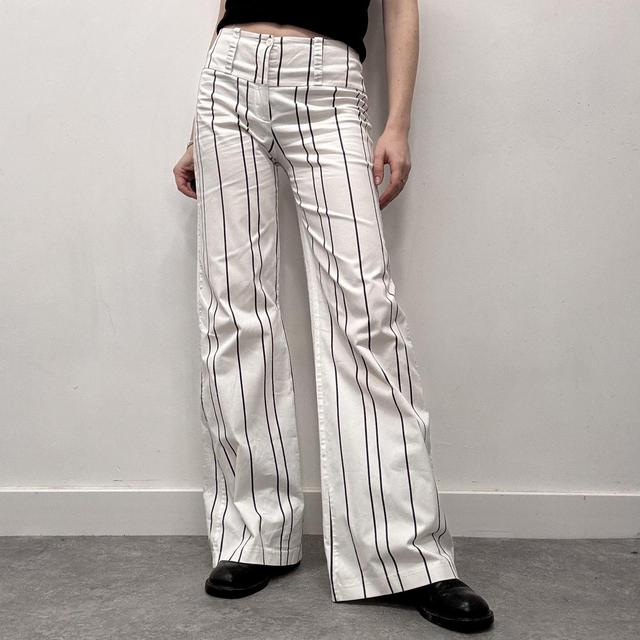 White pinstripe flared suit pants