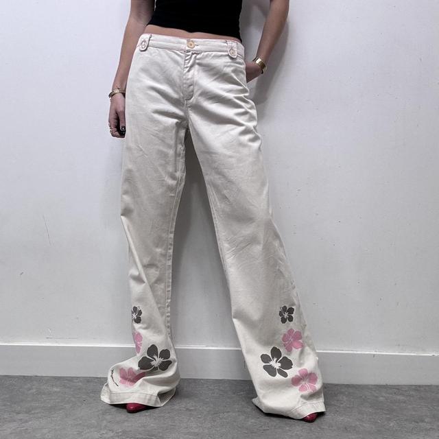 Flared beige wide leg printed trousers