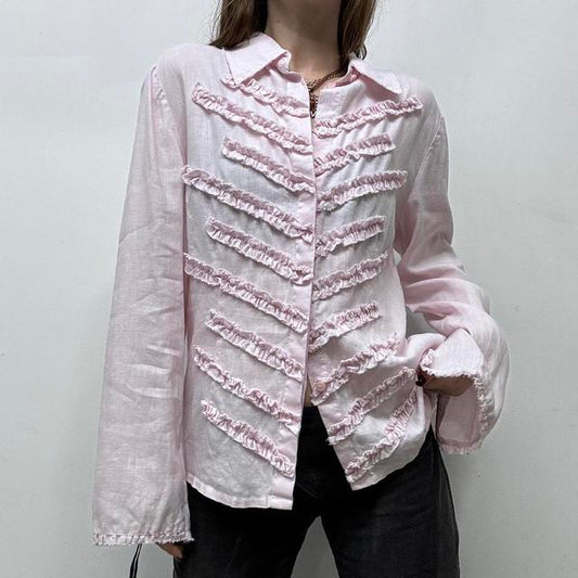 Pink flared distressed ruffle shirt