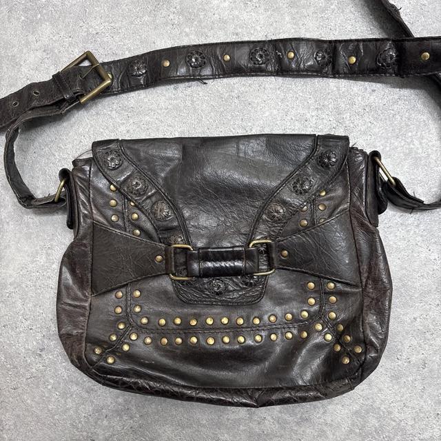 Studded brown leather bag