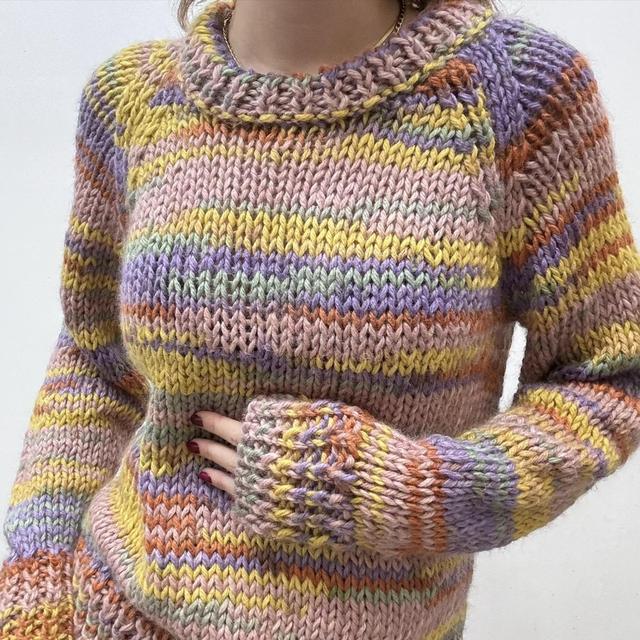 Colourful knitted rainbow jumper