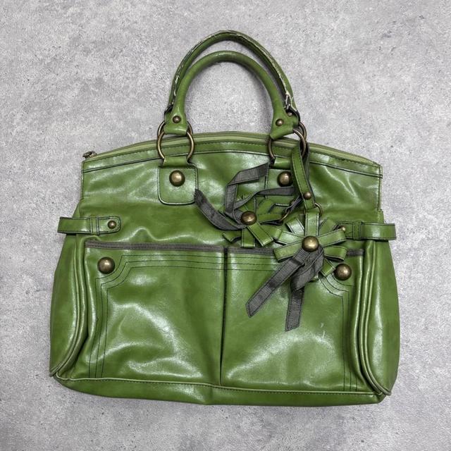 Green slouchy leather charm bag