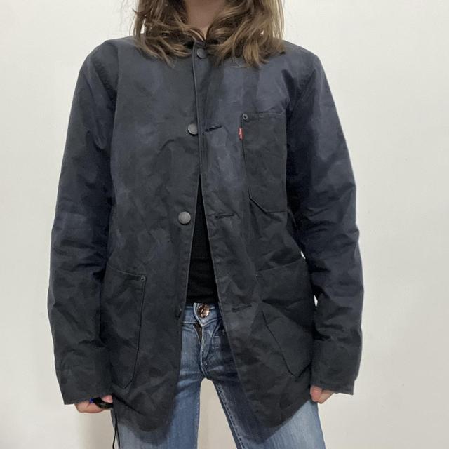 Distressed waxed cotton workwear jacket