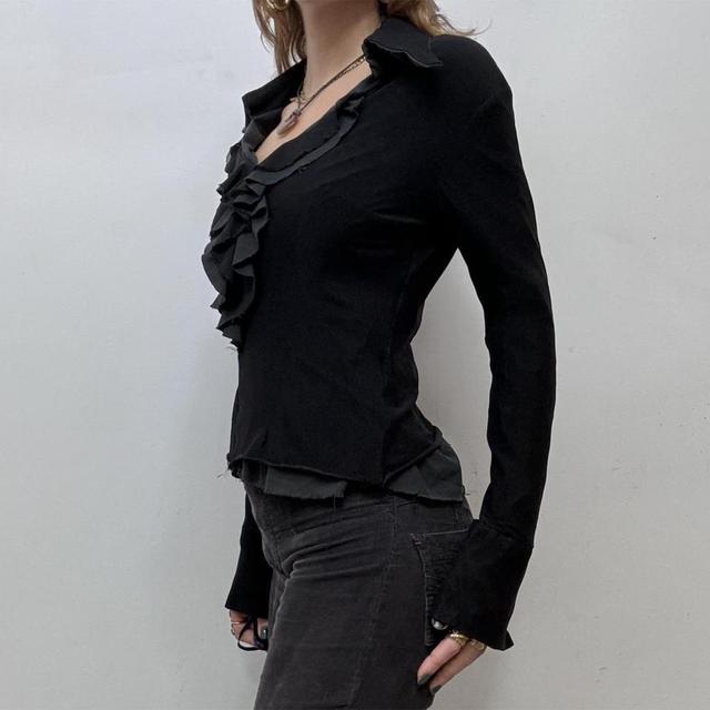 Black ruffle flare shirt