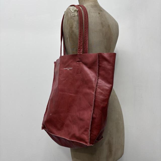 Red leather tote bag