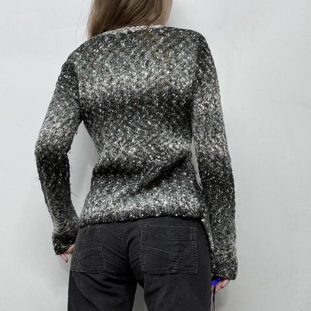 Asymmetric knitted flared jumper