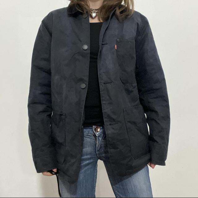 Distressed waxed cotton workwear jacket