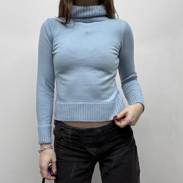 Pale blue wool knitted ribbed polo neck jumper