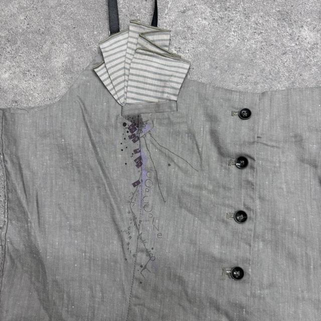 Grey asymmetric structured vest