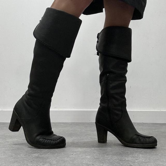 Black square toe leather boots