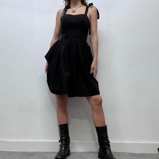 Black puff corset bow dress