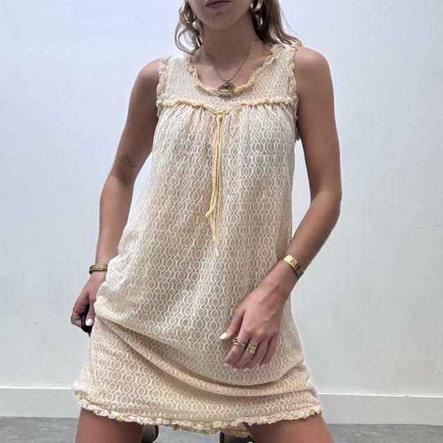 Sheer lace pastel mini dress