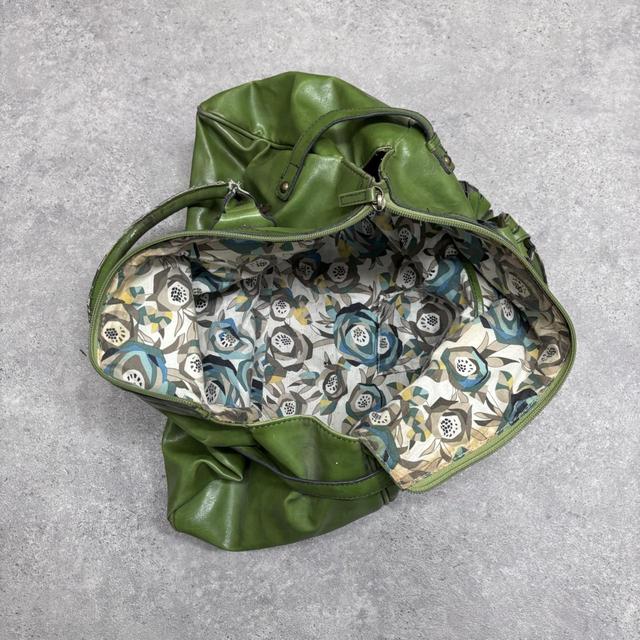 Green slouchy leather charm bag