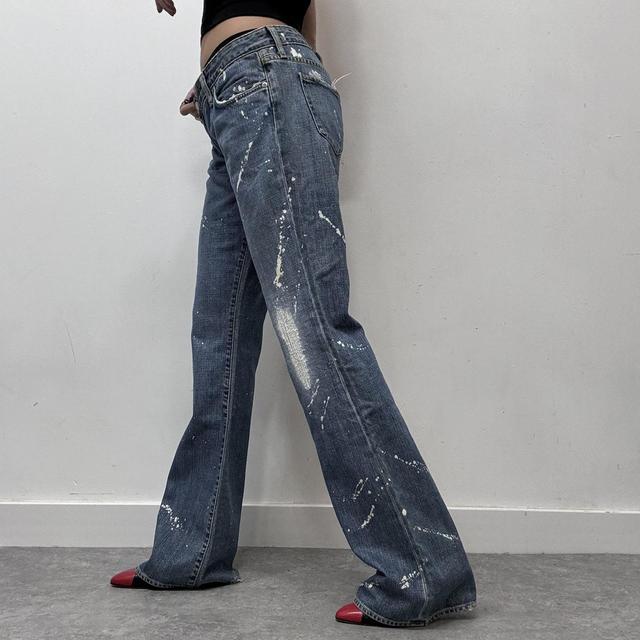 Flared distressed flared painted jeans