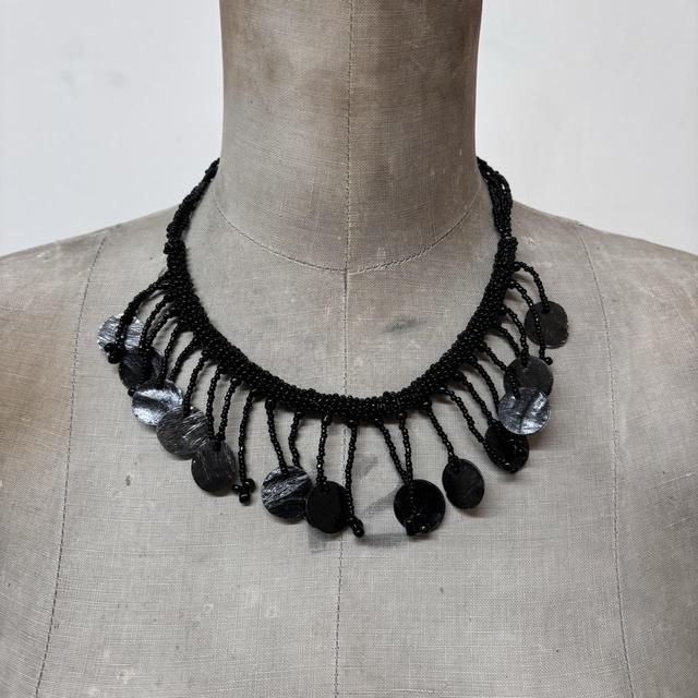 Black beaded drape