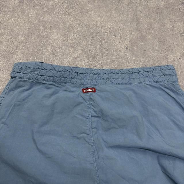 Blue puff cuffed parachute pants