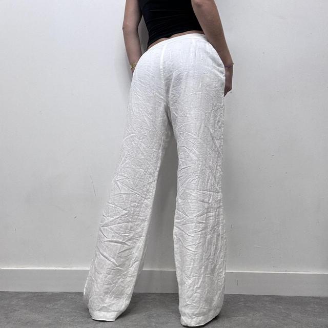 White linen flared wide leg trousers