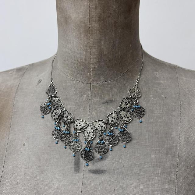 Silver boho wire flower necklace