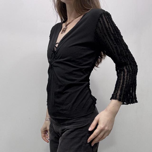 Sheer lace ribbed flared corset top