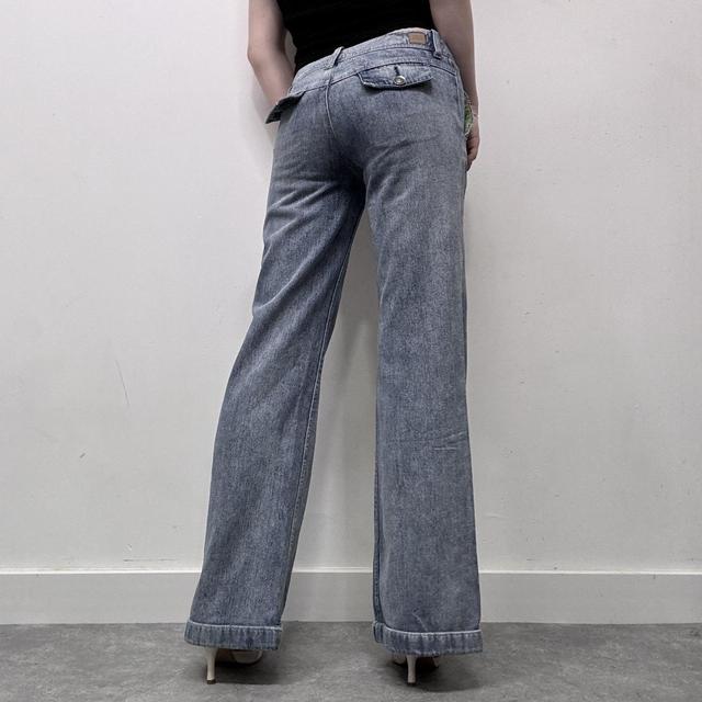 Low rise distressed flared jeans