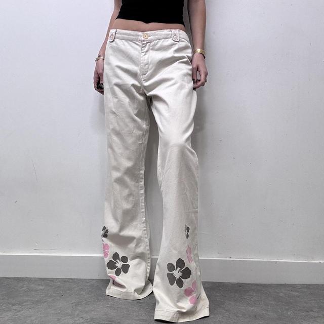 Flared beige wide leg printed trousers