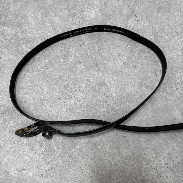 Black leather tortoise shell belt