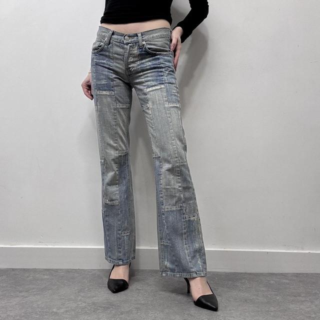 Distressed denim patchwork jeans
