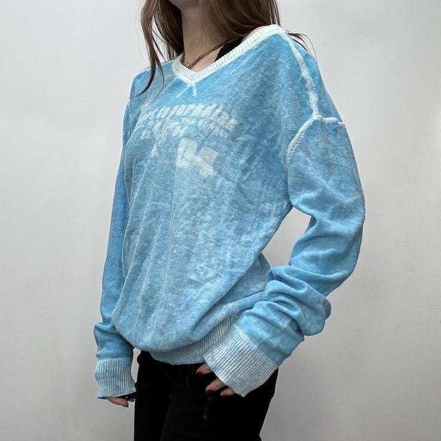 Slouchy oversized distressed knit jumper