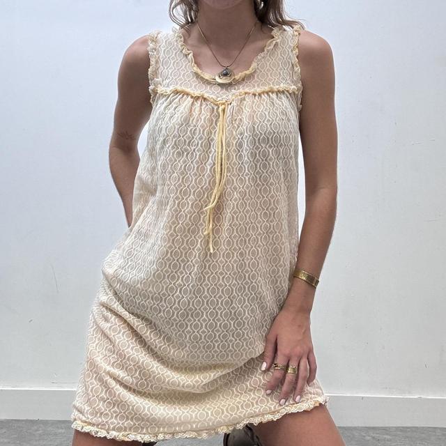 Sheer lace pastel mini dress