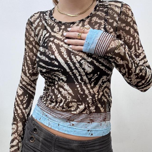 Sheer distressed graphic print mesh top