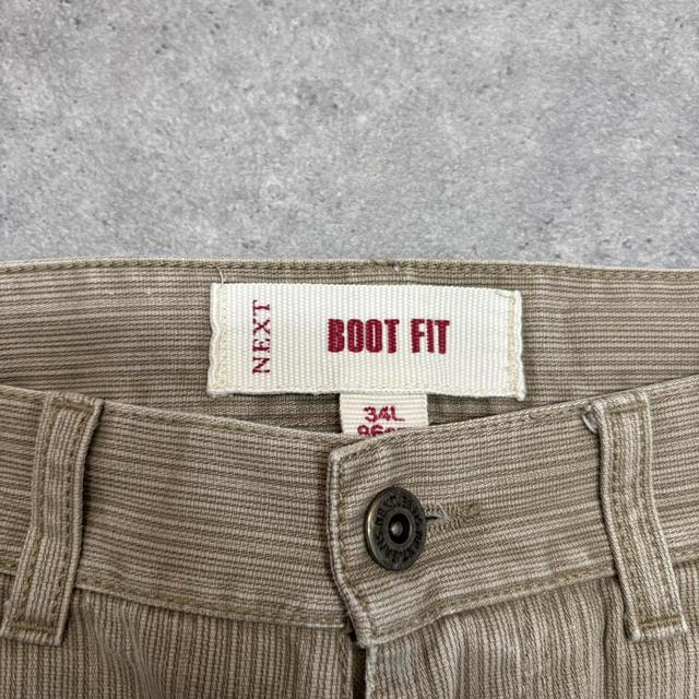 Distressed wash beige jeans