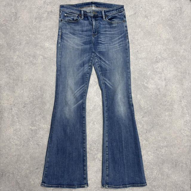 Flared distressed denim jeans