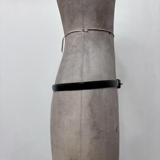 Black leather tortoise shell belt