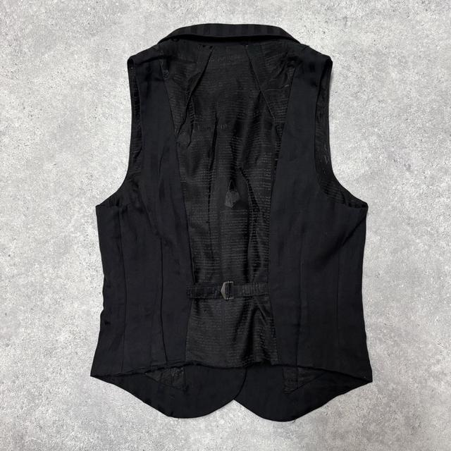 Pinstripe Galliano newspaper waistcoat