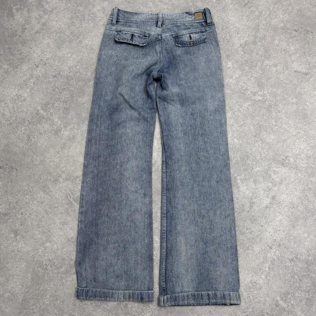 Low rise distressed flared jeans