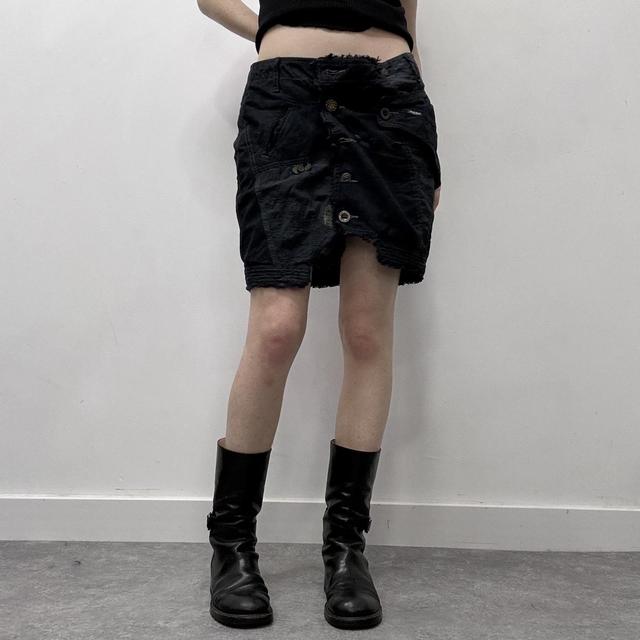 Distressed patchwork asymmetric skirt