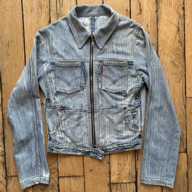 Distressed patched denim jacket