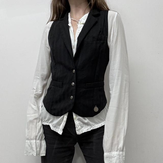 Pinstripe Galliano newspaper waistcoat