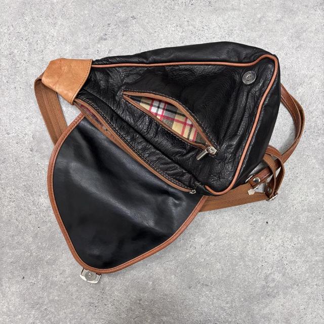 Black leather asymmetric backpack