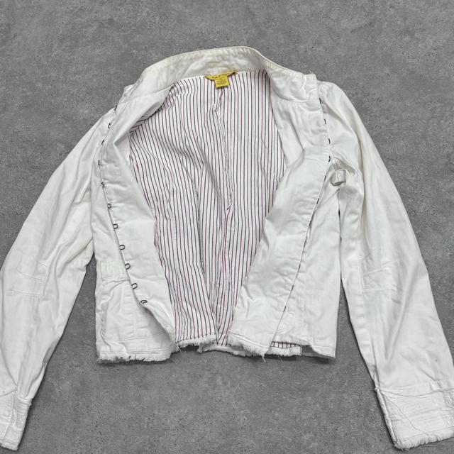 White flared eyelet jacket