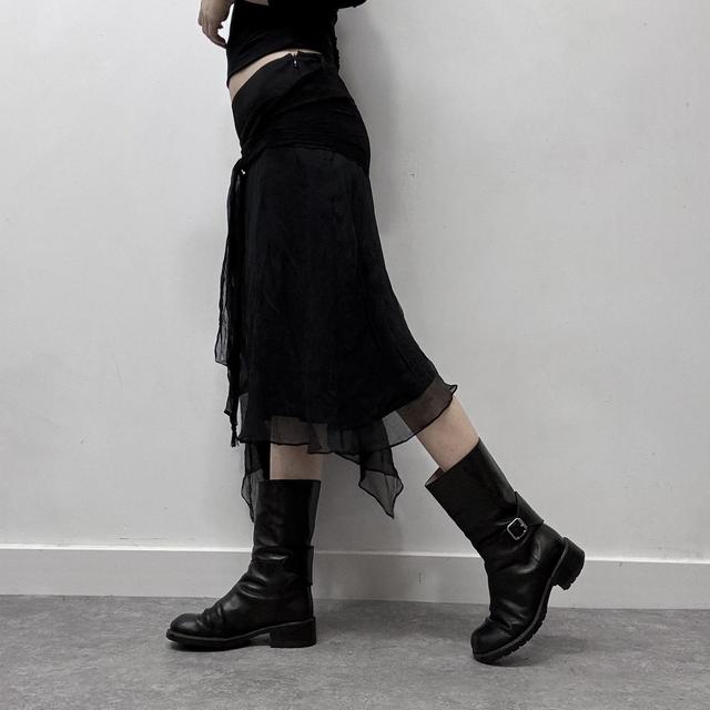 Sheer black asymmetric flutter skirt