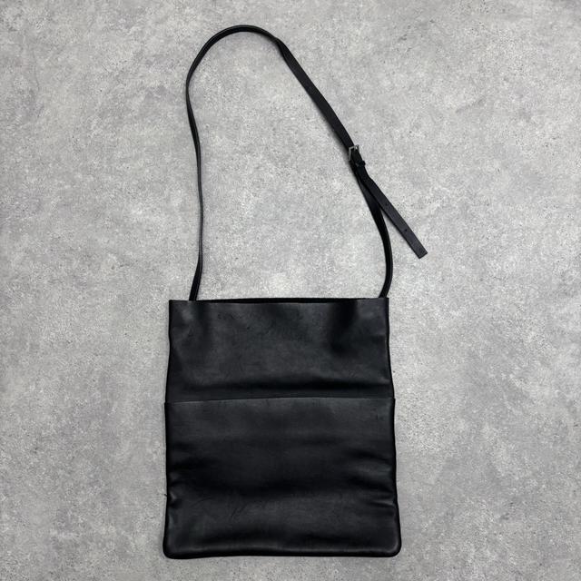 Black leather COS crossbody bag