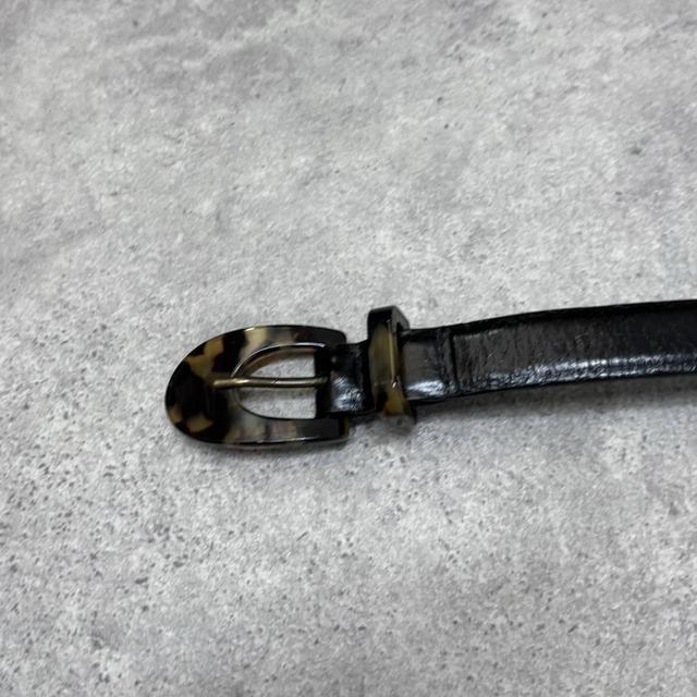 Black leather tortoise shell belt