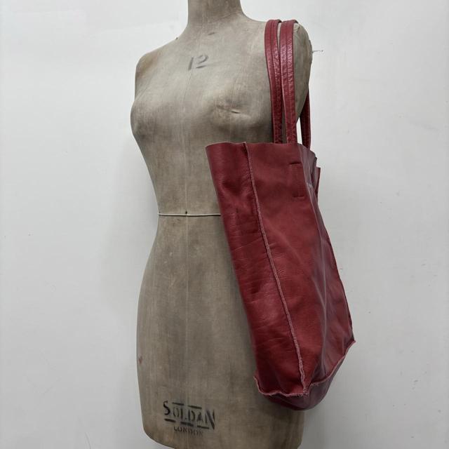 Red leather tote bag